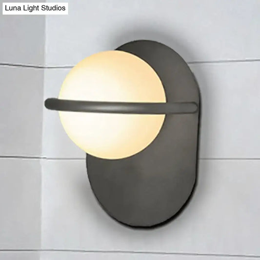 Black Gold Milk Glass Light wall sconce by Decorbites with black backplate and milk glass globe on Tampa Home & Garden Store