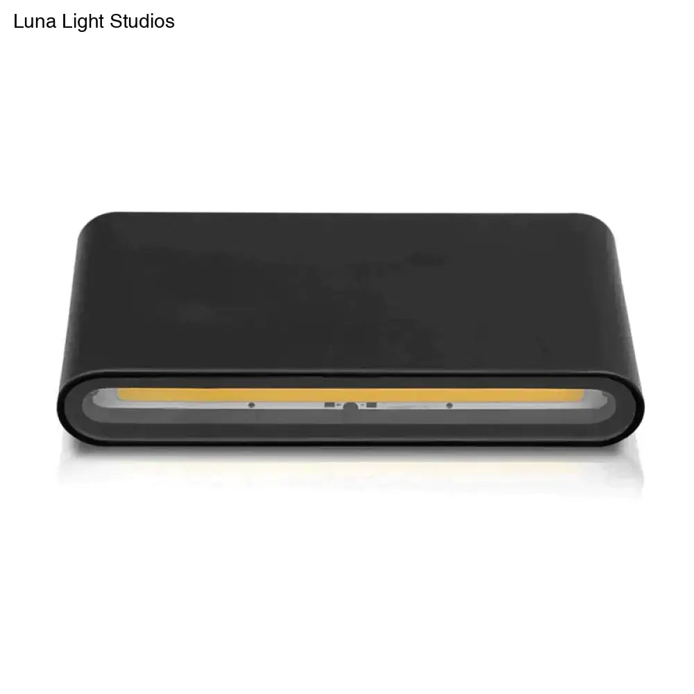Black outdoor wall light by Decorbites; rectangular rounded housing with integrated LED strip on Tampa Home & Garden Store