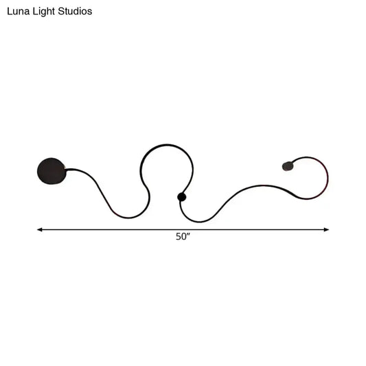 Modern black minimalist wall lamp with looping cord, 50-inch span, living room sconce on Tampa Home & Garden Store