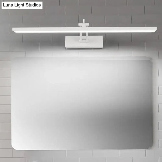 Black Rotatable Vanity Sconce by Decorbites with long light bar above a mirror on Tampa Home & Garden Store