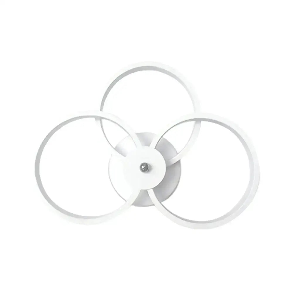White LED hoop wall lamp with three overlapping circular rings, modern bedroom decor on Tampa Home & Garden Store