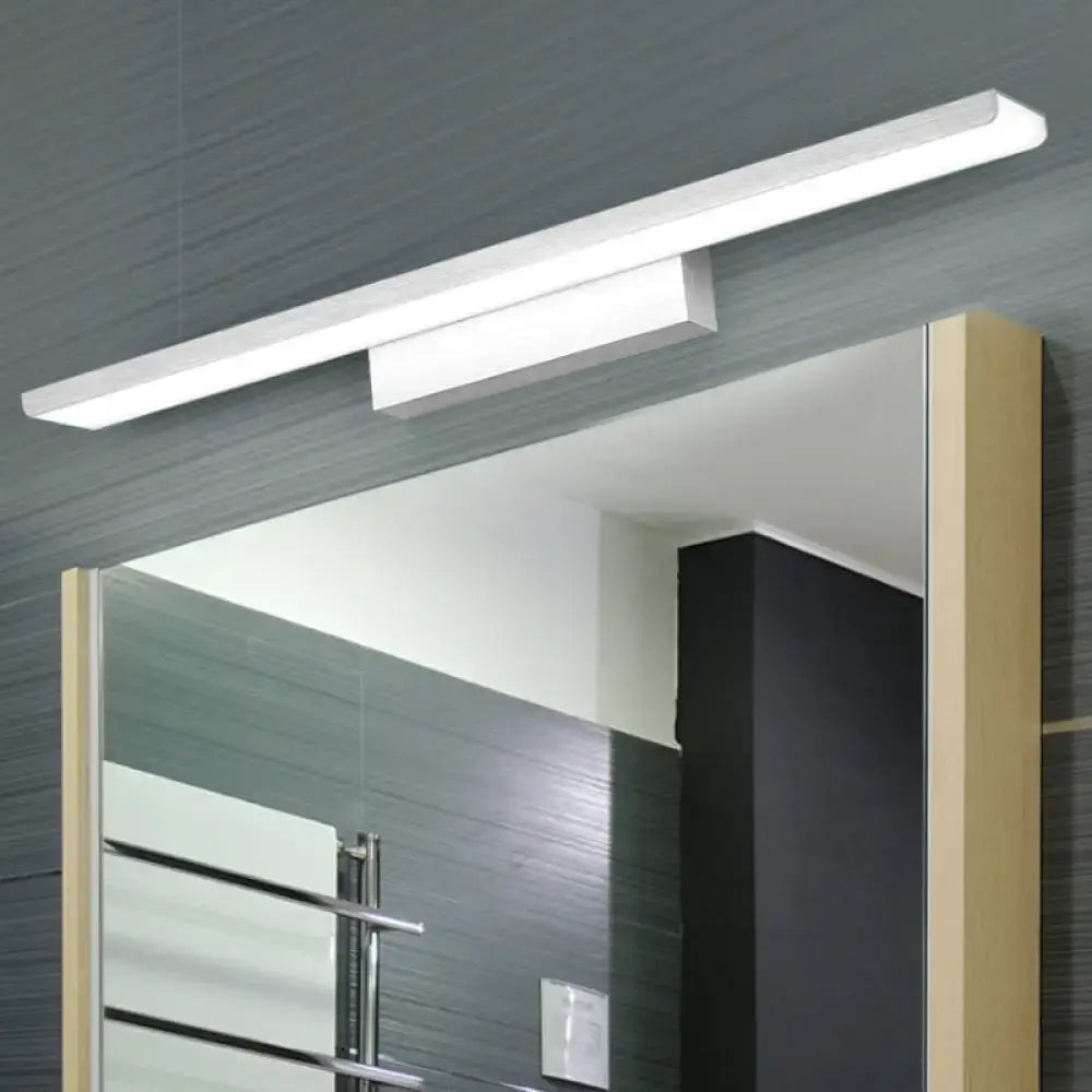 Modern aluminum bathroom vanity light, slim rectangular white bar mounted above mirror on Tampa Home & Garden Store