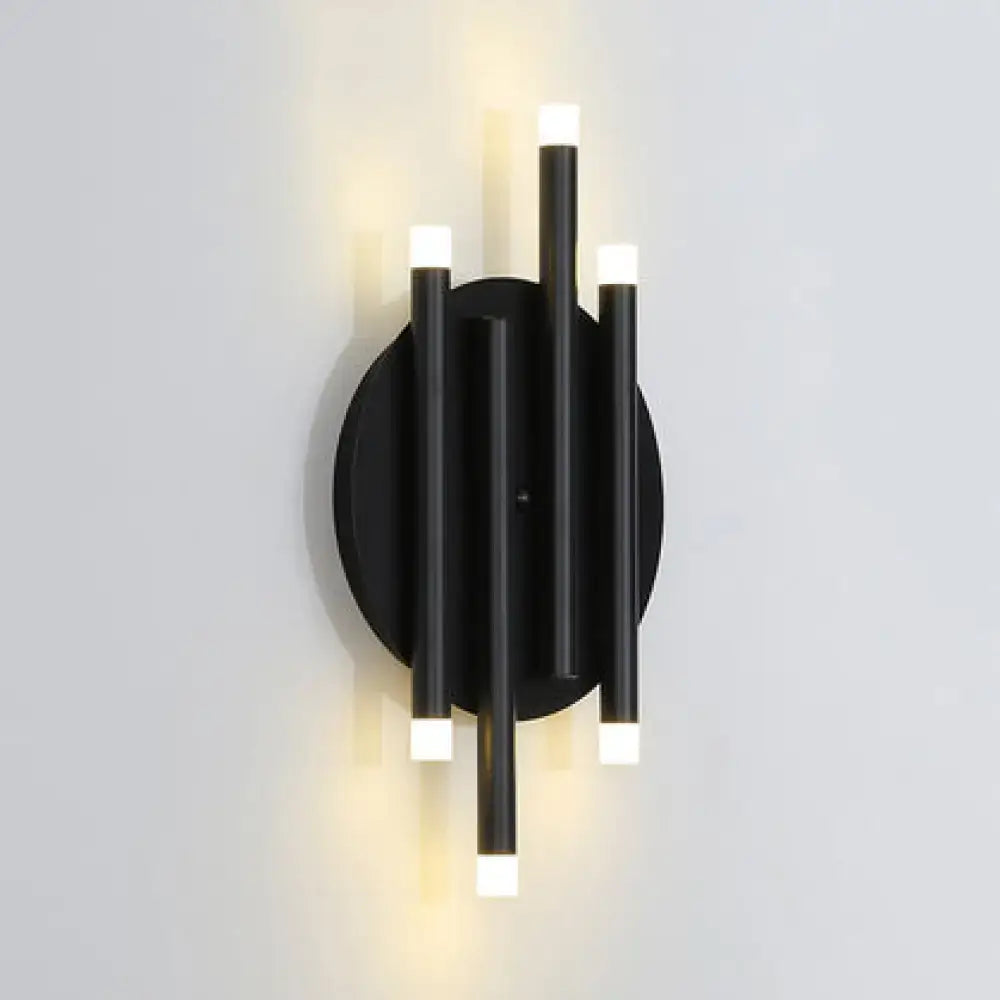Black round wall sconce with four vertical black rods and white LED caps by Decorbites on Tampa Home & Garden Store