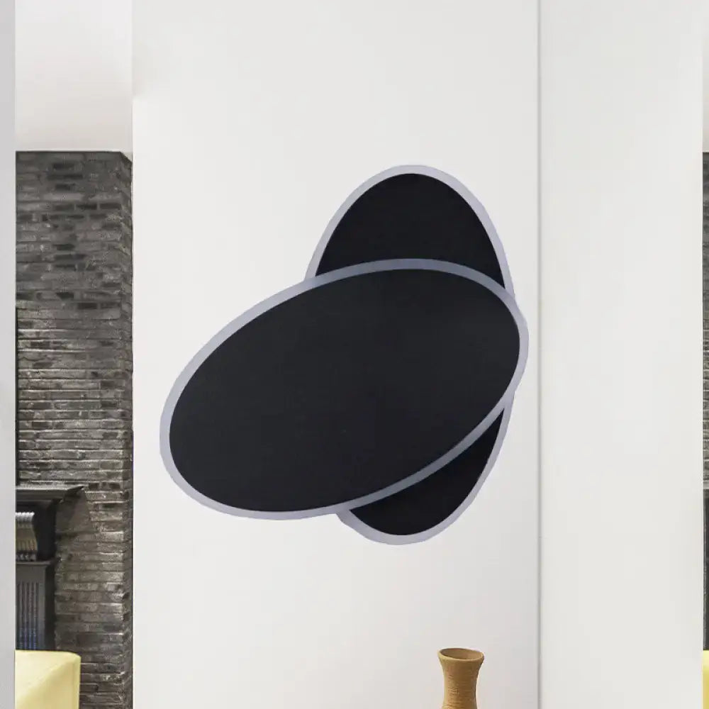 Black Oval Wall Sconce by Decorbites, matte black with light-gray trim, double-oval design on Tampa Home & Garden Store
