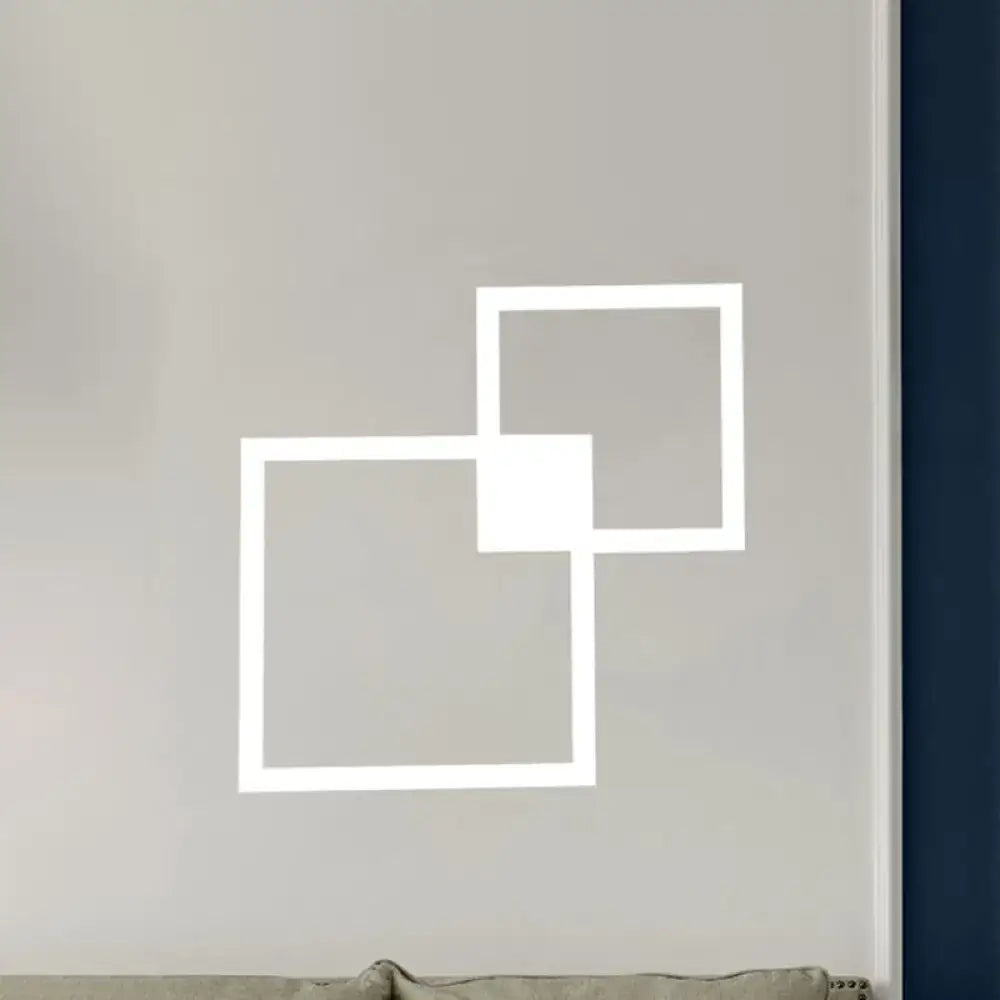 White overlapping square acrylic sconce geometric wall light on neutral wall on Tampa Home & Garden Store