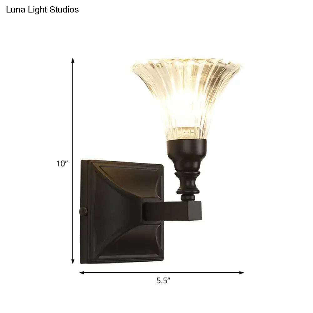 Black Flare Flush Sconce by Decorbites in black metal with a clear glass flare shade on Tampa Home & Garden Store