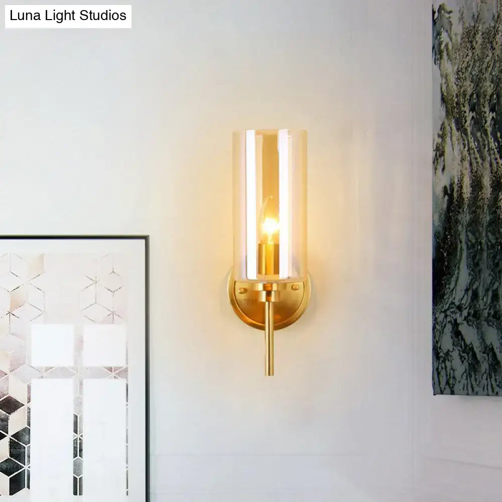 Brass smoked-glass cylindrical single-light sconce by Decorbites on Tampa Home & Garden Store