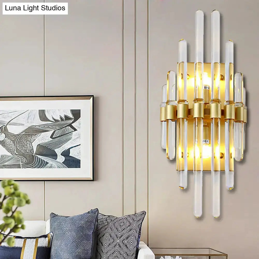 Modern brass crystal tube wall sconce with glass tubes and warm gold finish by Decorbites on Tampa Home & Garden Store