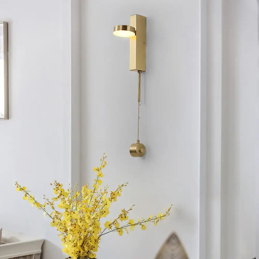 Decorbites brass L-shaped wall sconce with gold finish and pull chain on Tampa Home & Garden Store
