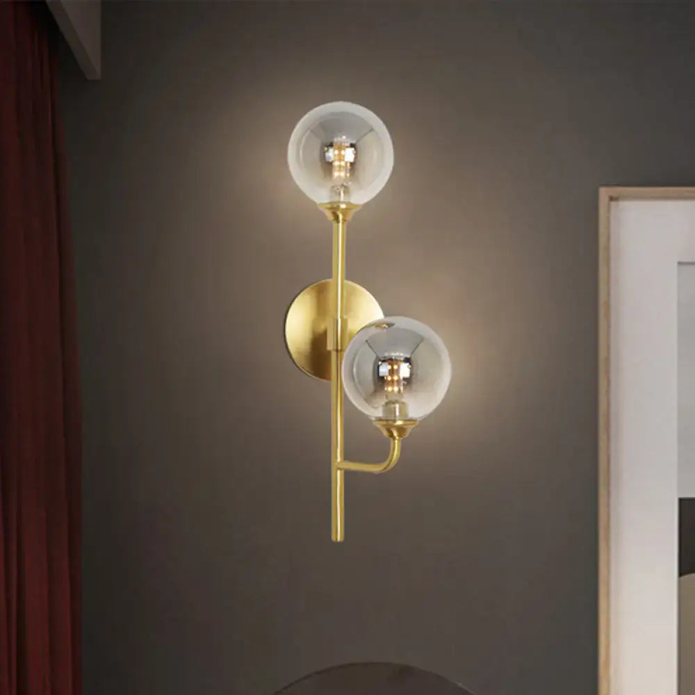 Brass sphere bathroom sconce by Decorbites with dual clear glass globes, wall-mount on Tampa Home & Garden Store