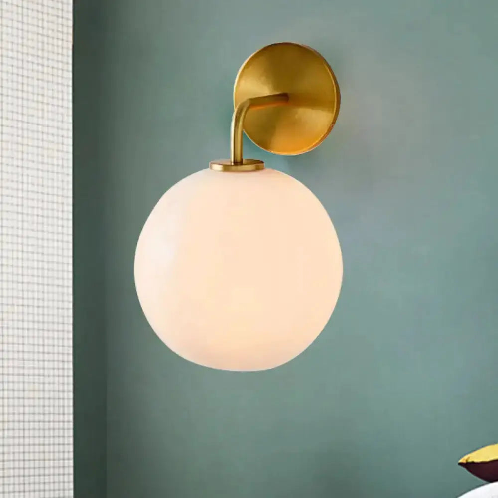 Modern Brass Wall Lamp with Glass Globe Bedroom