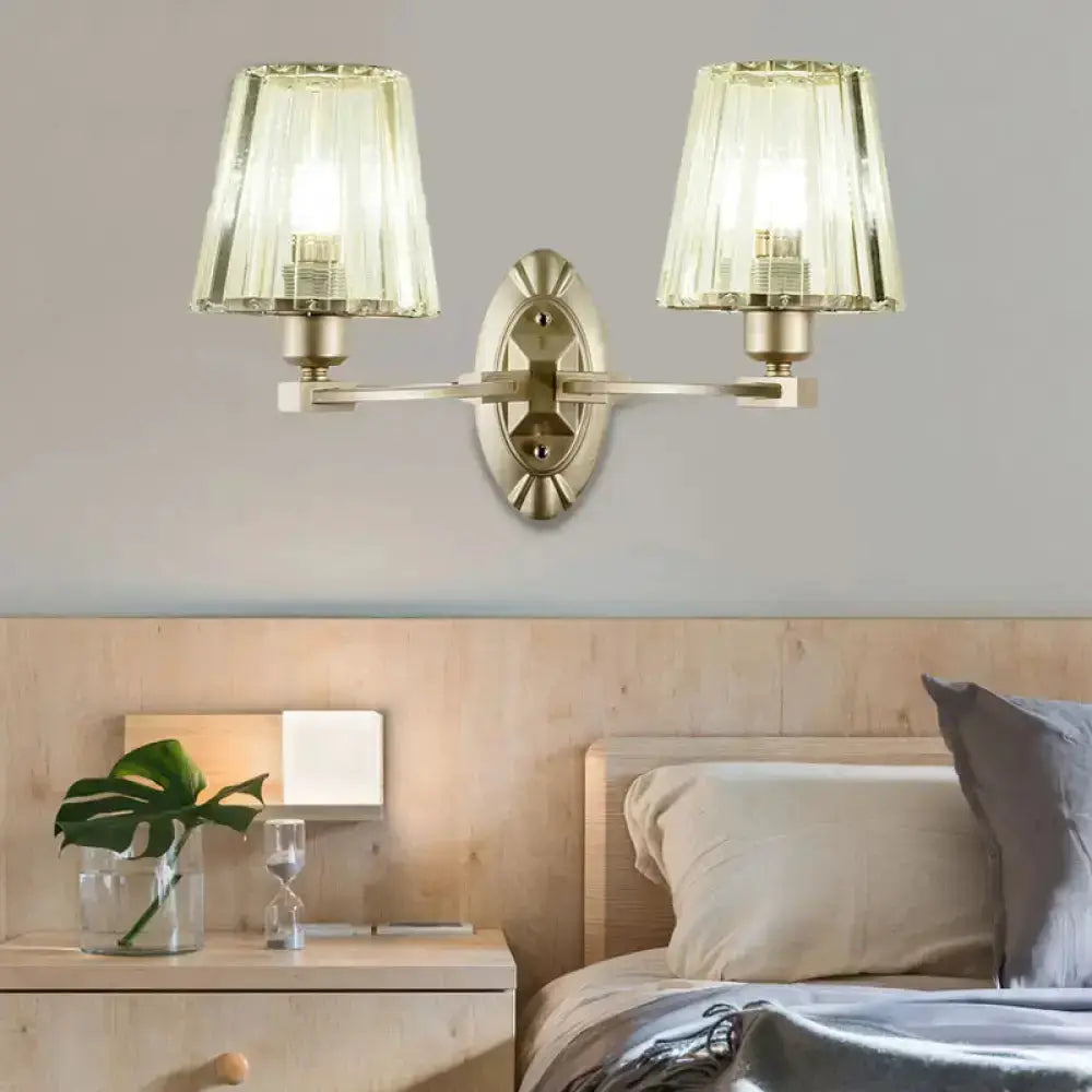 Decorbites modern brushed brass double-arm wall sconce with green glass shades for bedroom on Tampa Home & Garden Store