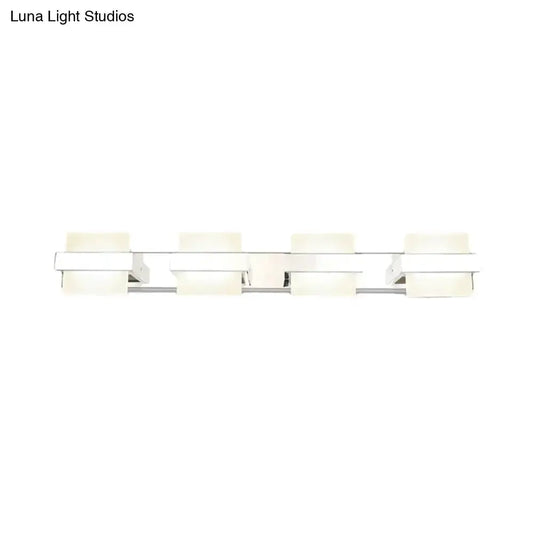 White acrylic LED vanity light fixture with five square frosted shades on a chrome bar on Tampa Home & Garden Store