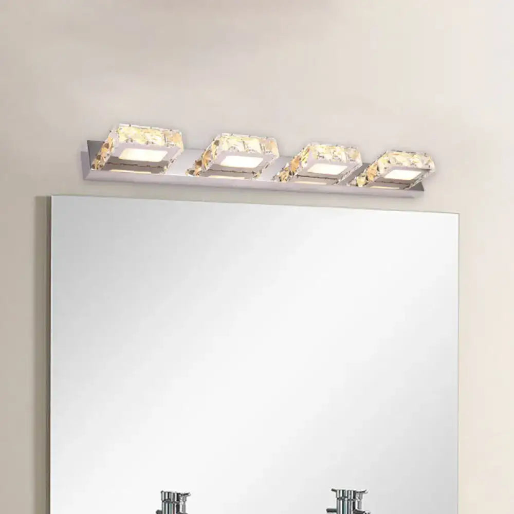 Chrome gold crystal vanity light with 3 square crystal fixtures above bathroom mirror on Tampa Home & Garden Store