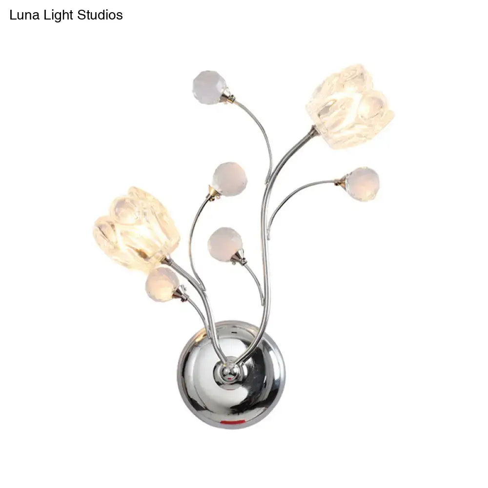 Chrome flower wall sconce with five curved stems and crystal petal bulbs on Tampa Home & Garden Store