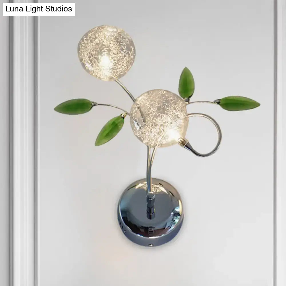 Green crystal leaf sconce wall lamp by Decorbites, metallic stem with emerald leaves on Tampa Home & Garden Store