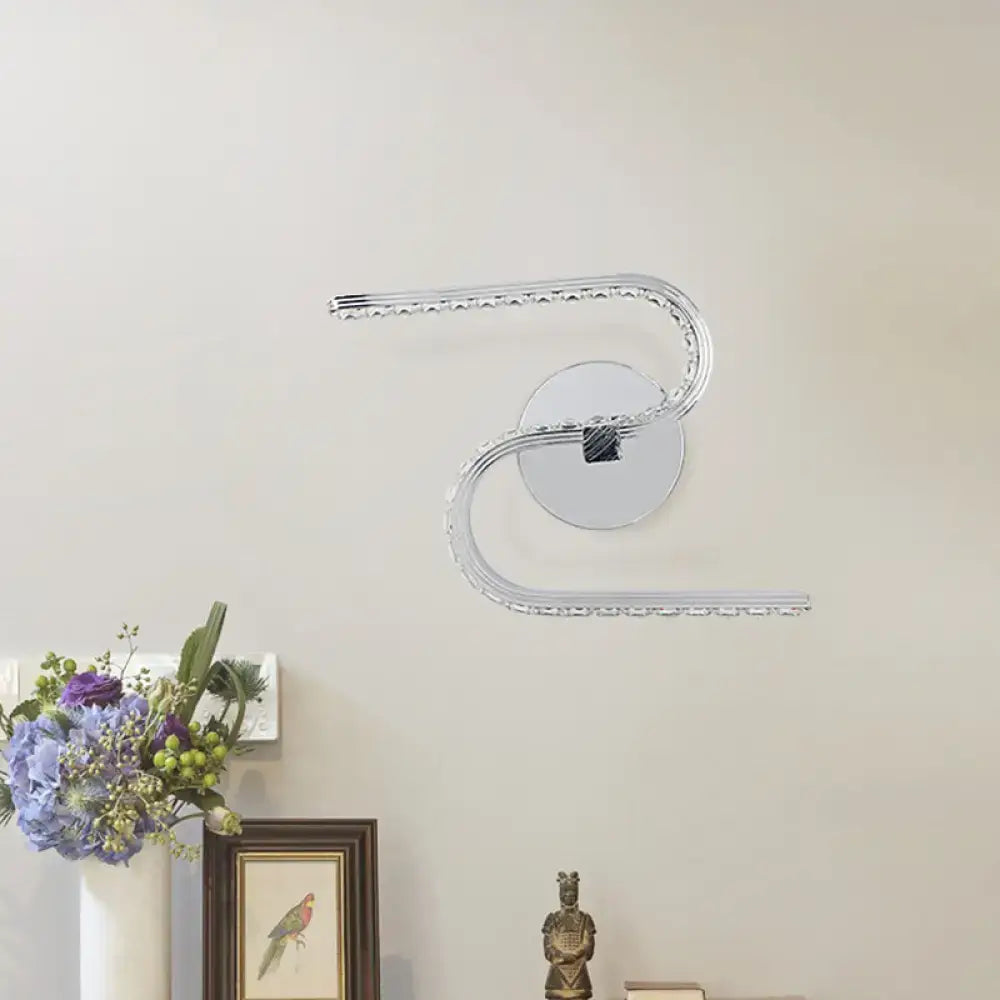 Chrome S-Shape Wall Sconce with circular mount and LED edge lighting on Tampa Home & Garden Store
