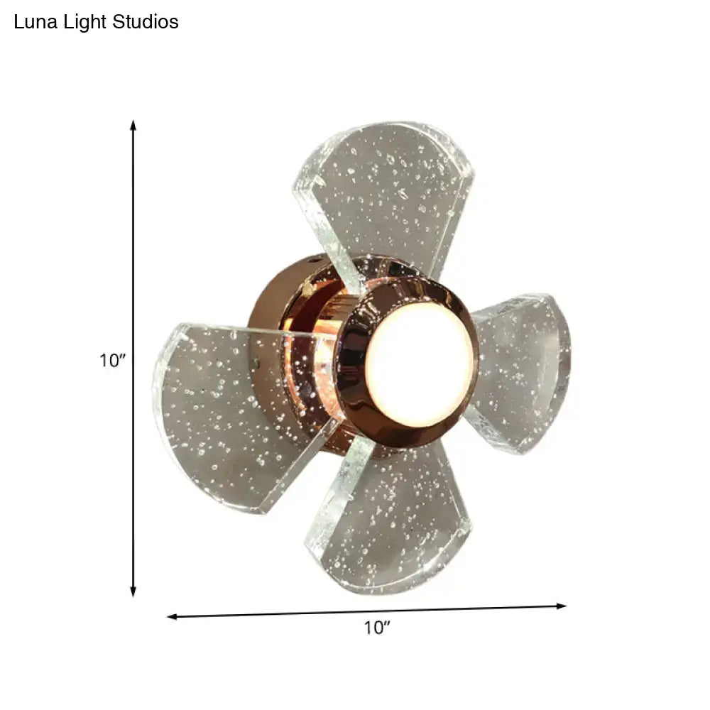 Copper starburst wall sconce with bronze center and speckled glass petals by Decorbites on Tampa Home & Garden Store