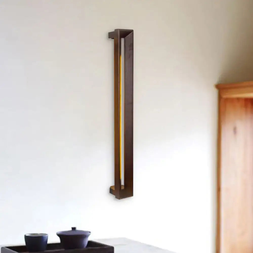 Dark wood LED sconce vertical wall light by Decorbites with warm yellow LED strip on Tampa Home & Garden Store