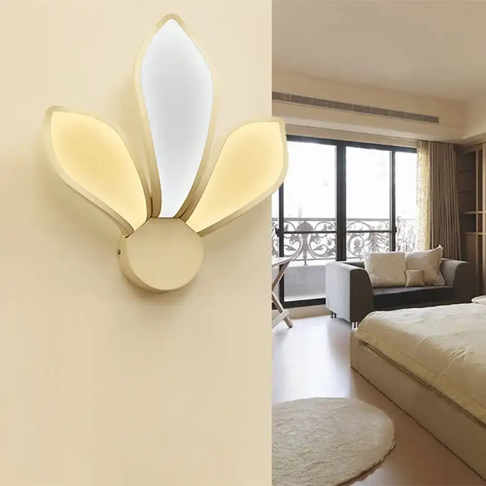 Decorbites white acrylic petal wall sconce with three flower-like petals and warm glow on Tampa Home & Garden Store