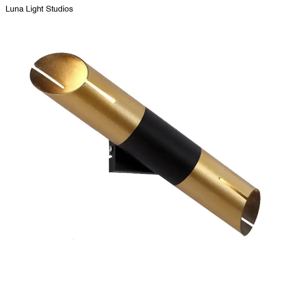 Gold Black Cylinder Sconce by Decorbites with brass finish and black midsection on Tampa Home & Garden Store