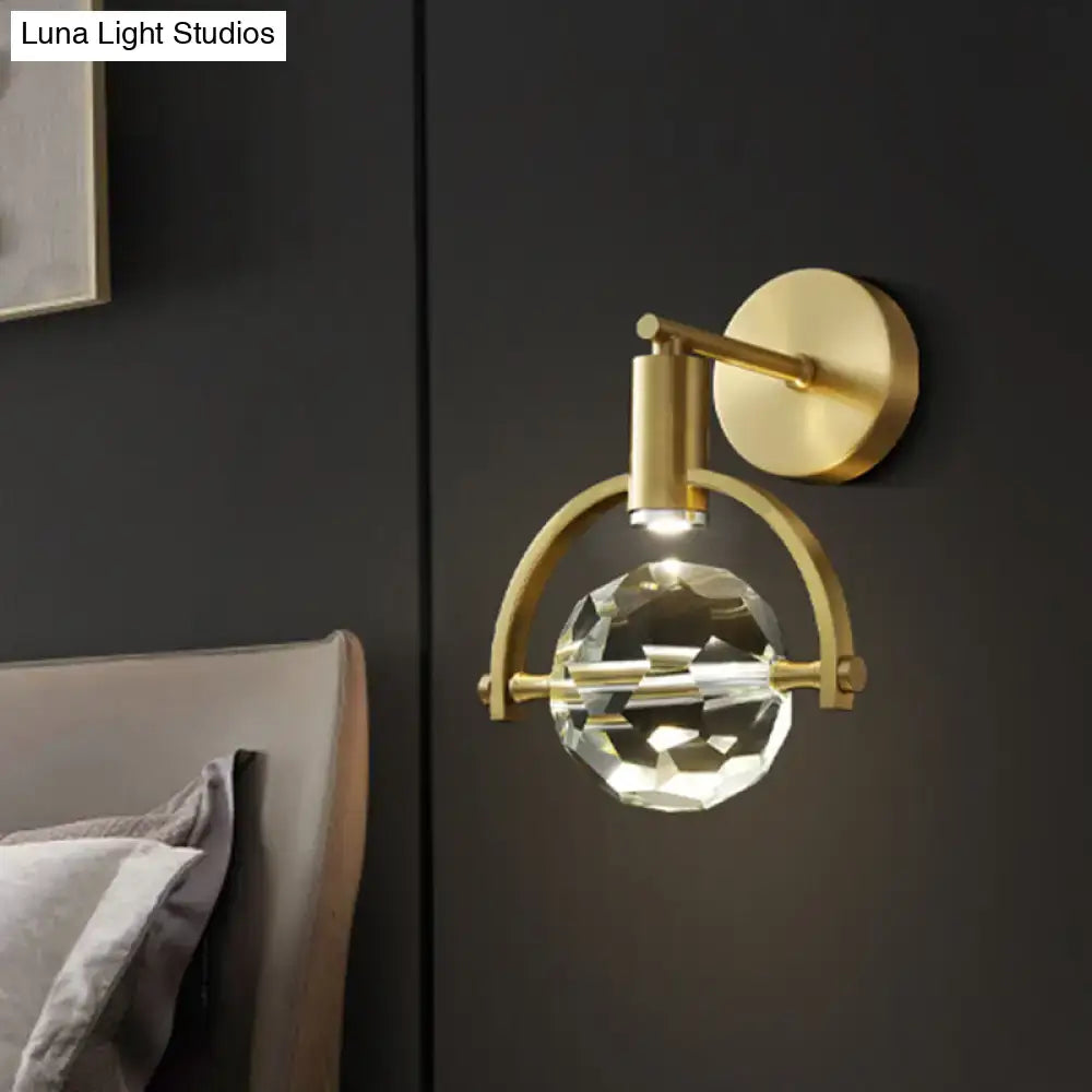 Decorbites Translucent Crystal LED Wall Lamp in gold finish with a faceted crystal orb on Tampa Home & Garden Store