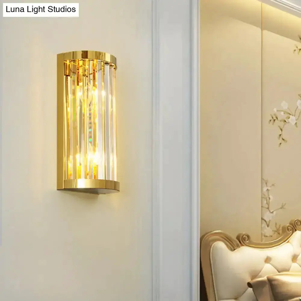 Modern gold crystal wall sconce with vertical crystal prisms, gold metal finish Decorbites on Tampa Home & Garden Store