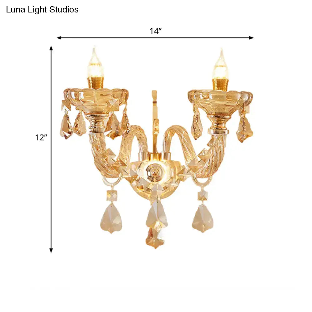 Gold crystal faceted two-head candle sconce by Decorbites with hanging prisms on Tampa Home & Garden Store