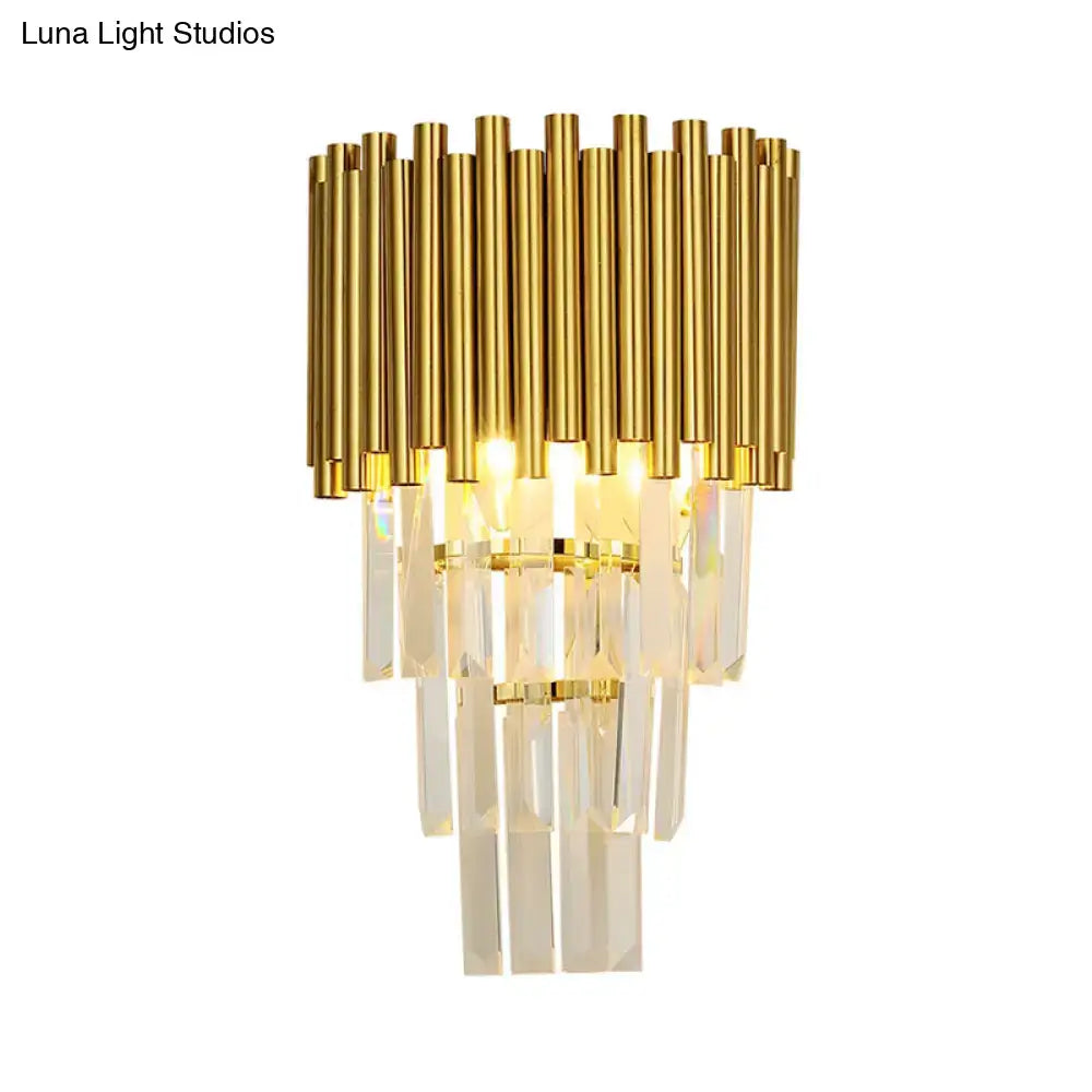 Gold crystal E14 sconce with stacked gold tubes and hanging clear prisms Decorbites on Tampa Home & Garden Store