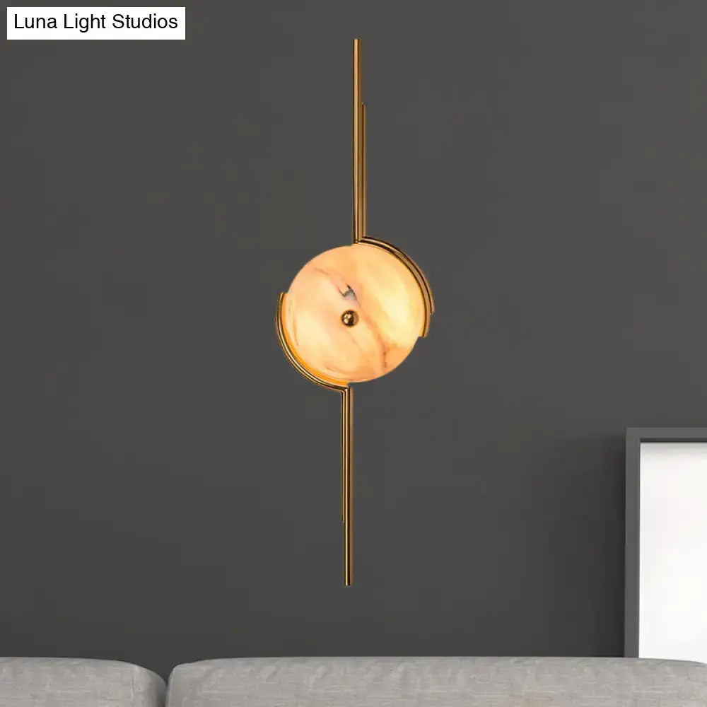 Gold Marble LED Wall Light by Decorbites, gold metal wall with marble disc, warm glow on Tampa Home & Garden Store