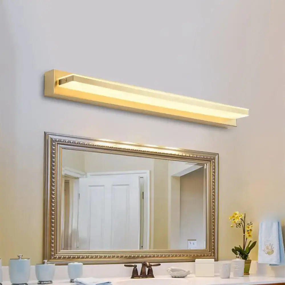 Gold LED wall sconce with rectangular acrylic shade above bathroom vanity on Tampa Home & Garden Store