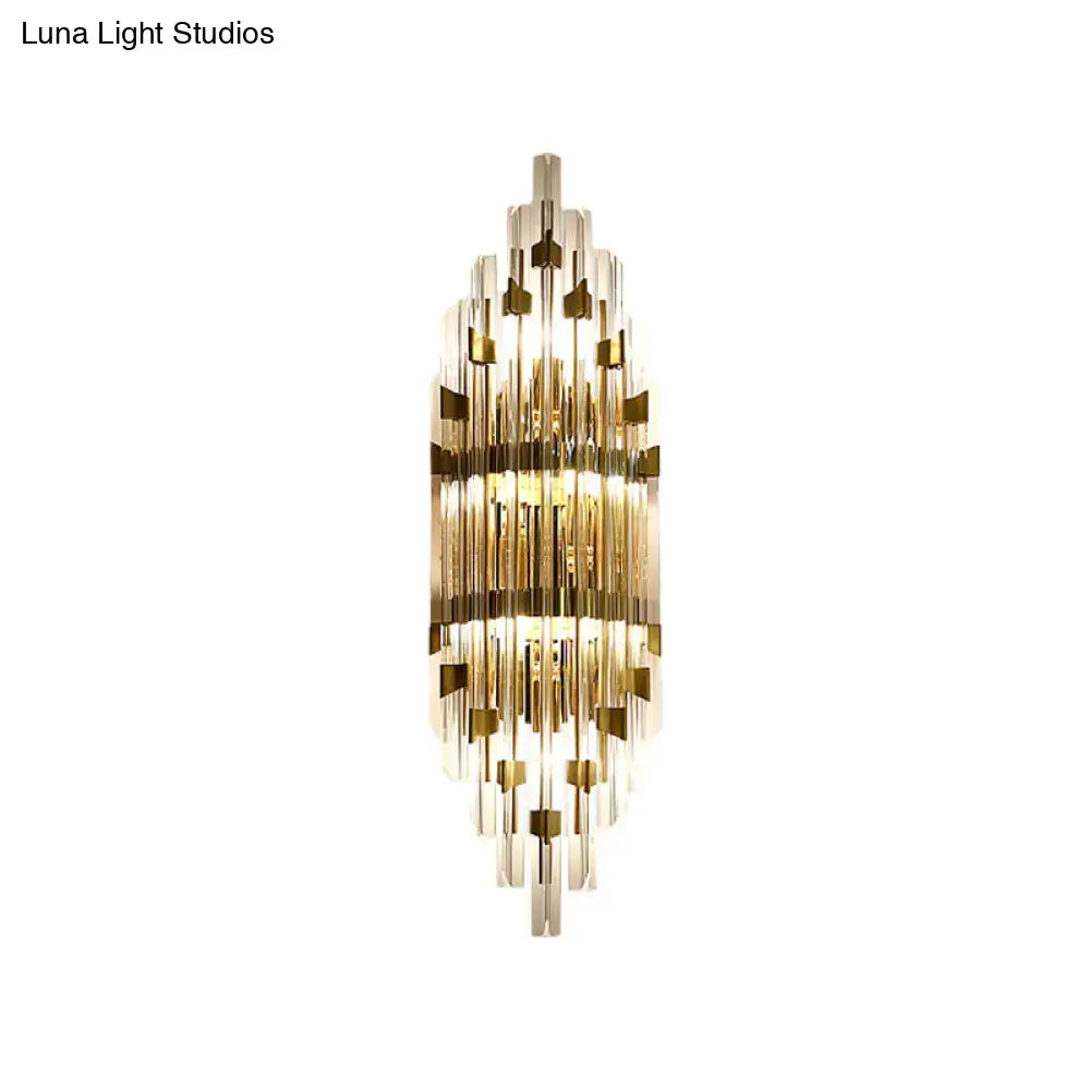 Gold crystal three-light rod sconce by Decorbites with cascading glass rods on Tampa Home & Garden Store