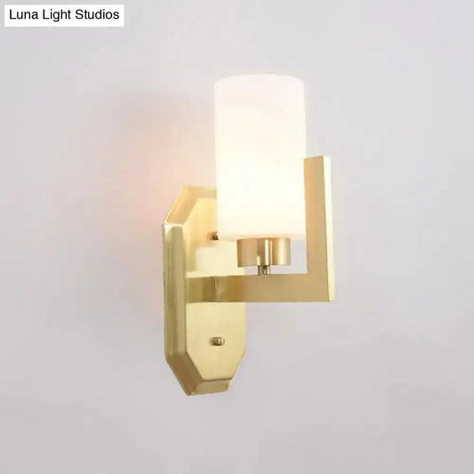 Modern gold tubular wall lamp with frosted glass shade by Decorbites for living room on Tampa Home & Garden Store