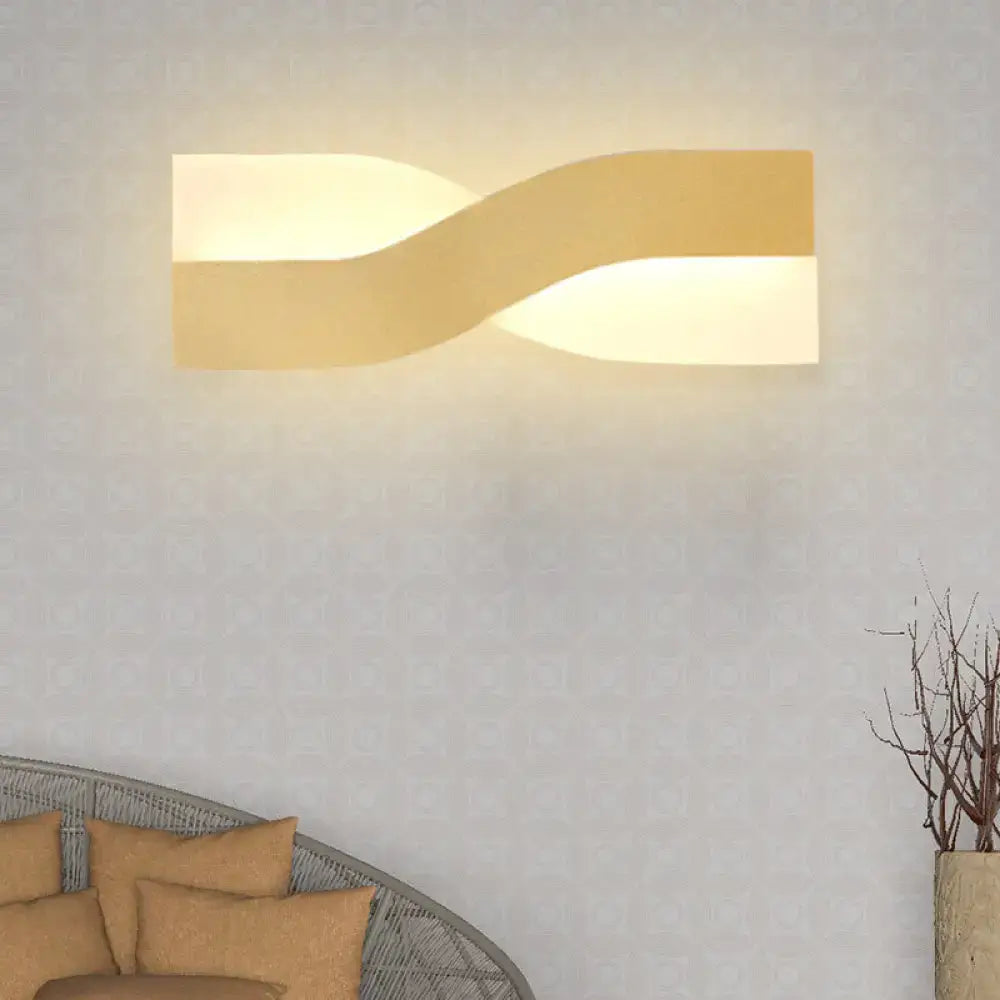 Gold twisted LED wall lamp with acrylic design, warm glow, Decorbites on Tampa Home & Garden Store