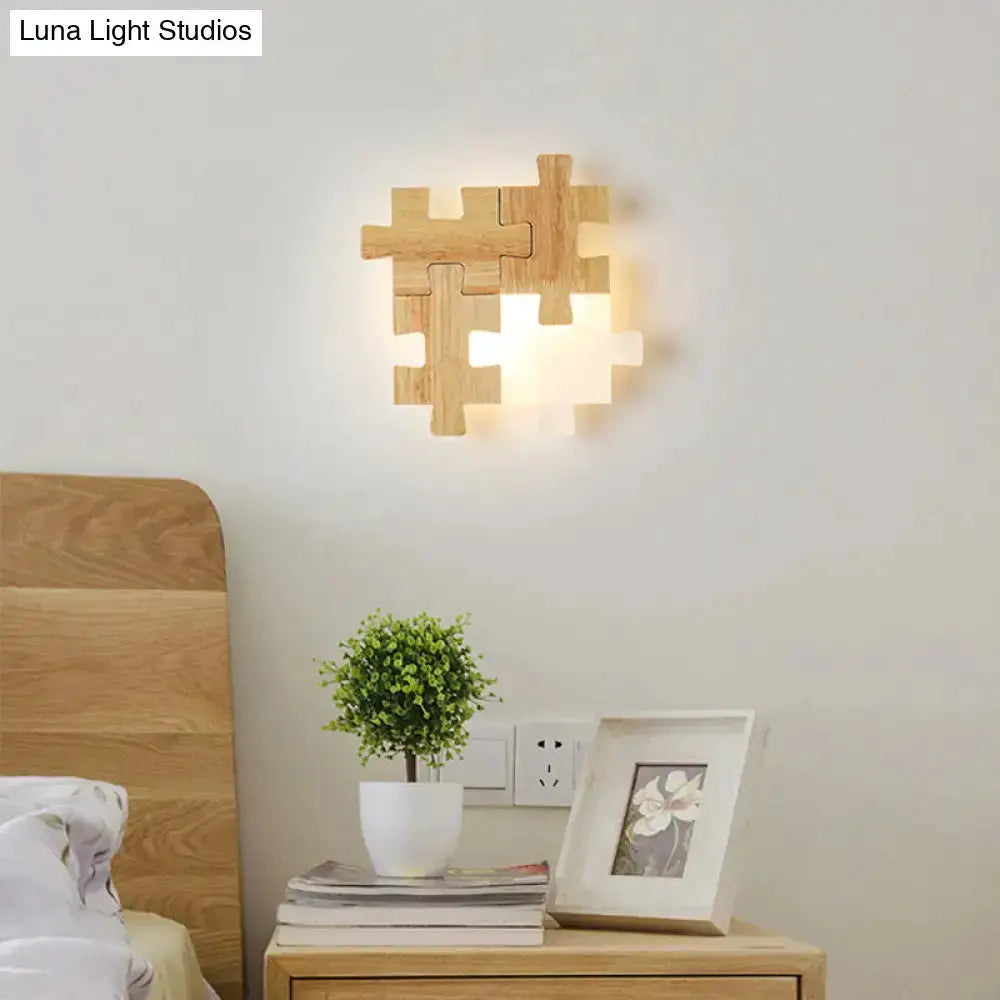 Decorbites modern jigsaw wood wall lamp sconce with warm LED glow in natural wood decor bedroom on Tampa Home & Garden Store
