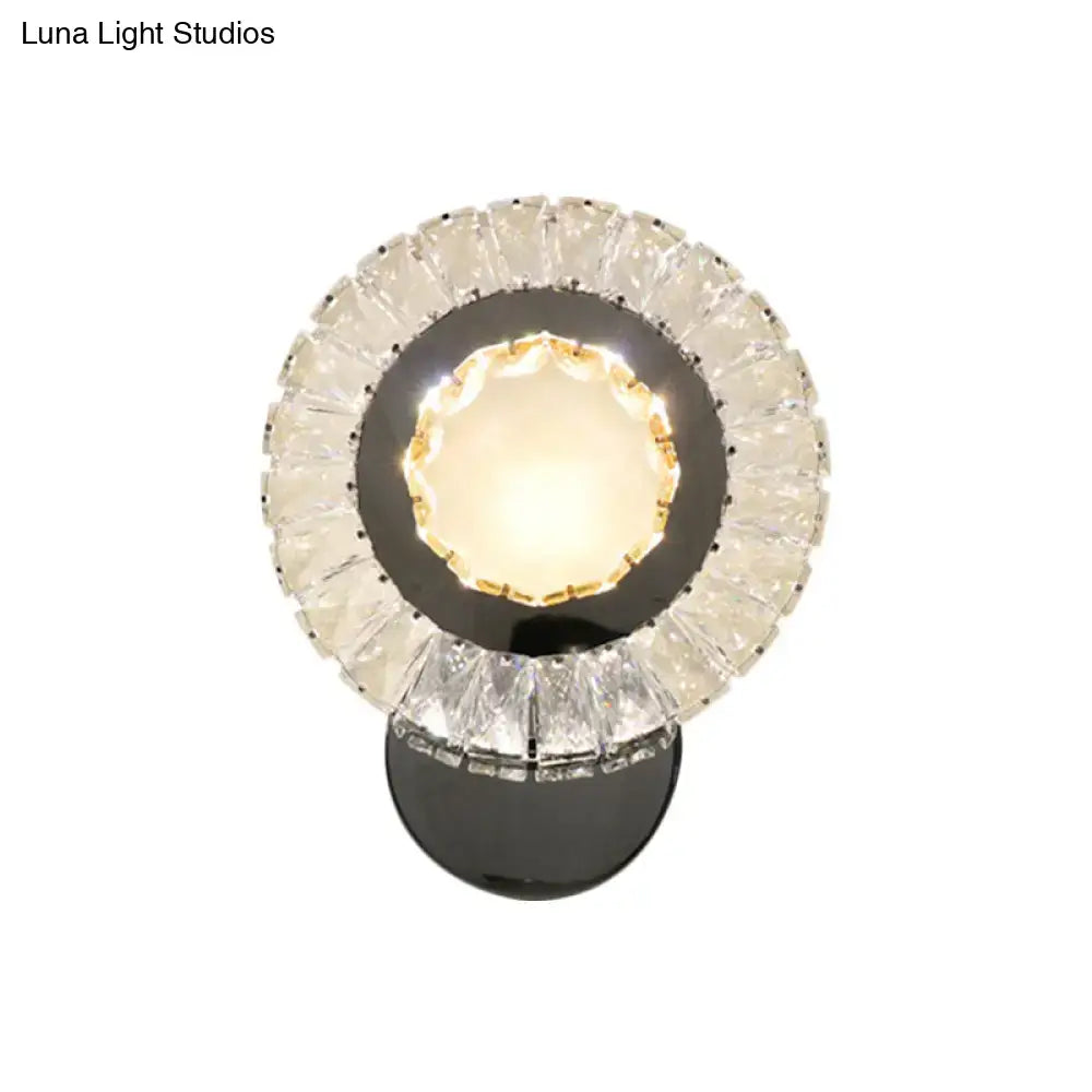 Decorbites Crystal LED Wall Lamp with circular crystal ring and warm LED light on black mount on Tampa Home & Garden Store