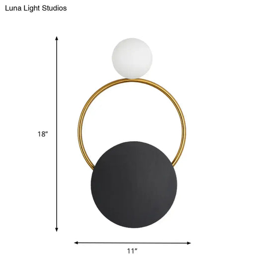 Black Gold Wall Light Sconce with gold ring and black disc and white globe by Decorbites on Tampa Home & Garden Store