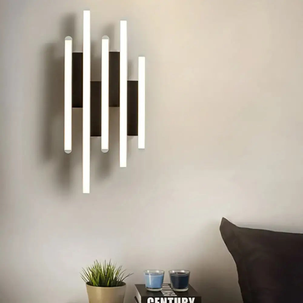 White acrylic wall sconce with multi-height vertical bars, modern lighting fixture on wall on Tampa Home & Garden Store