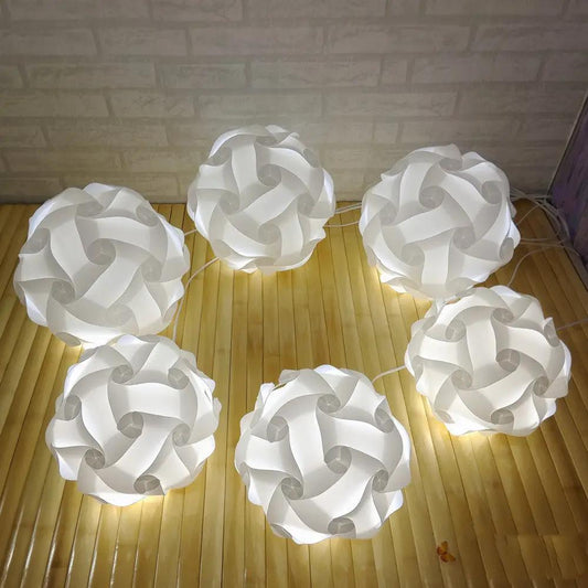 Modern minimalist chandelier, white orb pendant lights with interlocking panels, six globes on Tampa Home & Garden Store