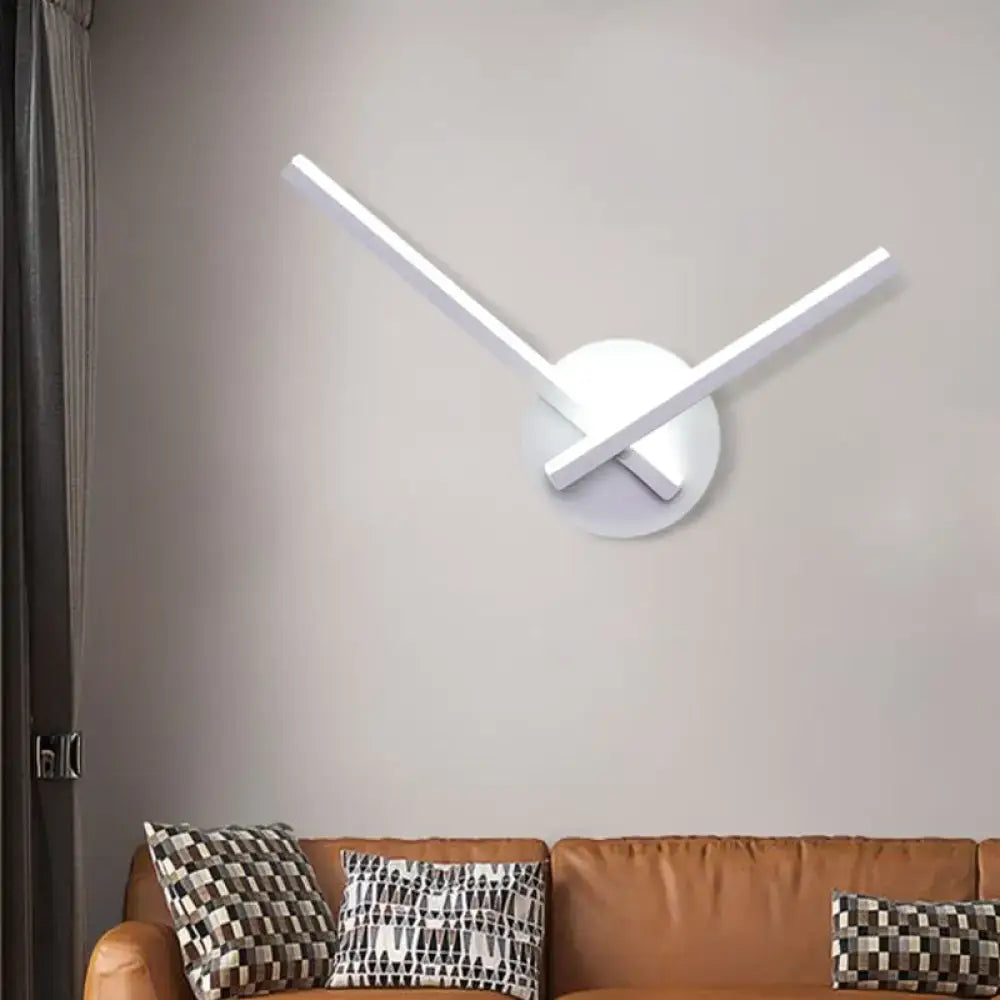 White ceiling light direct wired by Decorbites with two LED bars forming an X on a mount on Tampa Home & Garden Store