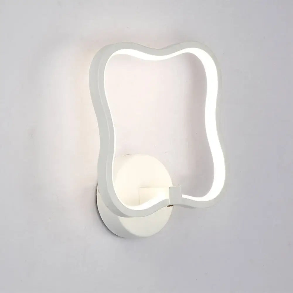 White curved square wall sconce with LED glow by Decorbites on Tampa Home & Garden Store
