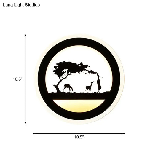 Black acrylic built-in shelf wall sconce with elephant silhouette under a tree by Decorbites on Tampa Home & Garden Store