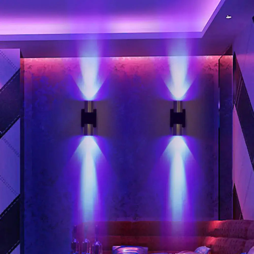 Decorbites silver aluminum wall light; two blue uplight sconces on Tampa Home & Garden Store