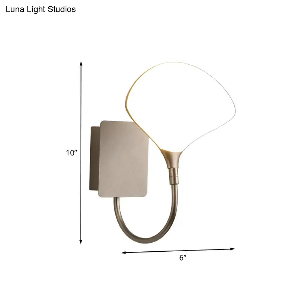 Gold arched acrylic wall lamp with a clear shade on a square backplate on Tampa Home & Garden Store