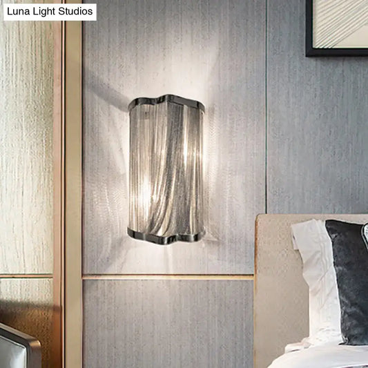 Silver tassel aluminum wall light sconce with ribbed glass shade by Decorbites on Tampa Home & Garden Store