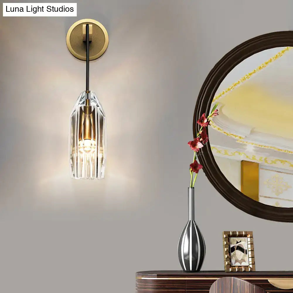 Brass Crystal Wall Sconce with clear faceted shade, wall mounted in compact bedroom decor on Tampa Home & Garden Store