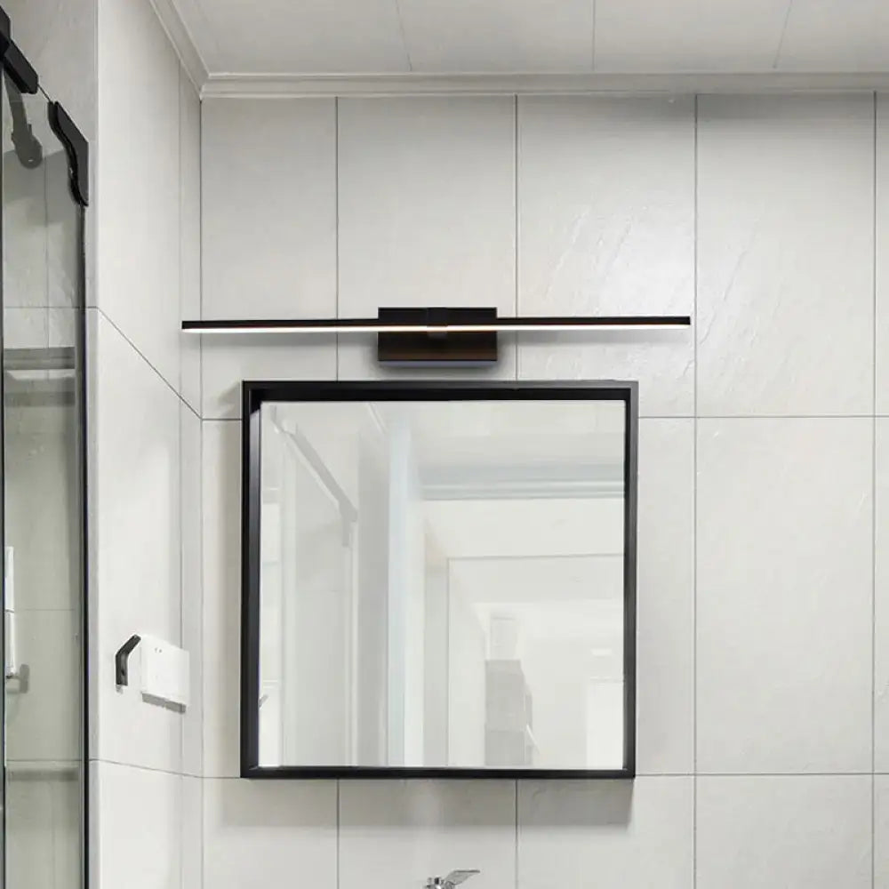 Black LED wall light bar above a square bathroom mirror in a modern bathroom on Tampa Home & Garden Store