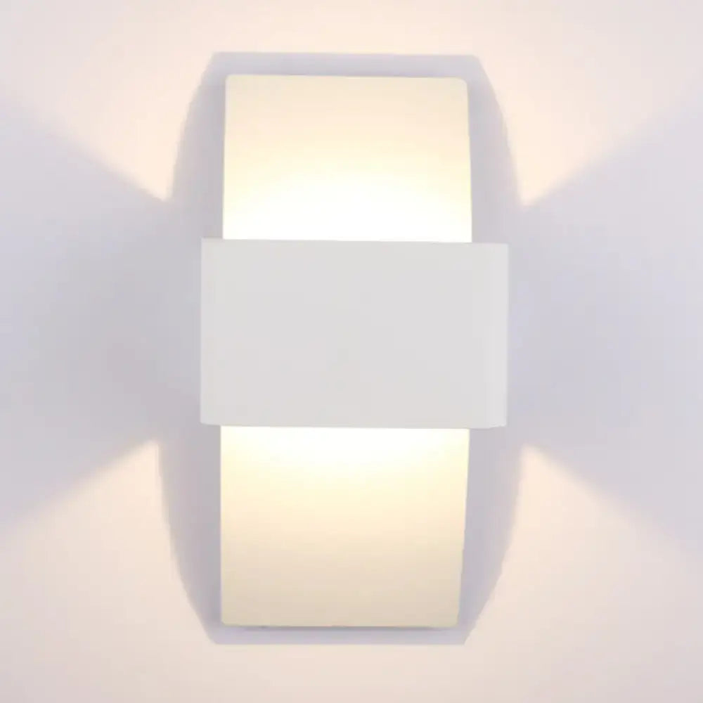 White LED warm compact sconce by Decorbites with rectangular panels emitting soft light on Tampa Home & Garden Store