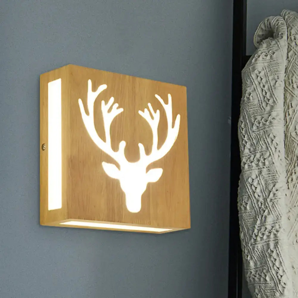 Decorbites bamboo wall light with square wooden panel and deer antler cutout, wall mounted on Tampa Home & Garden Store