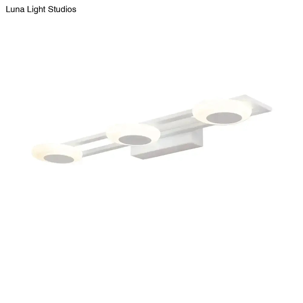 Modern white 3-light LED wall-mounted vanity sconce with circular heads on a horizontal bar on Tampa Home & Garden Store